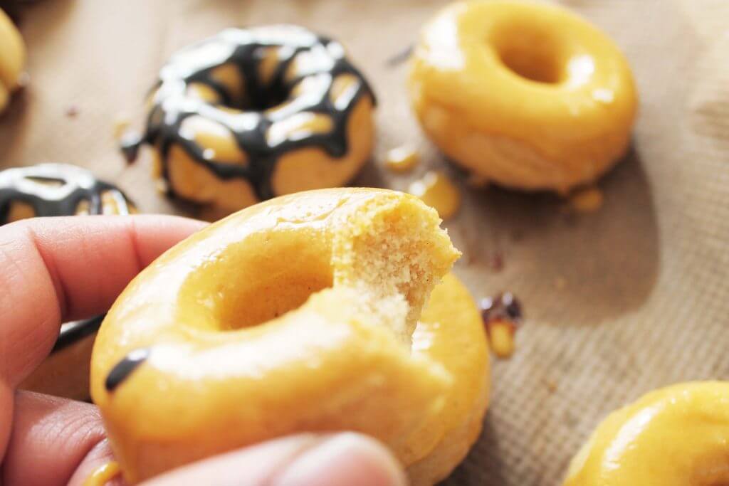hand holding Pumpkin CBD donuts