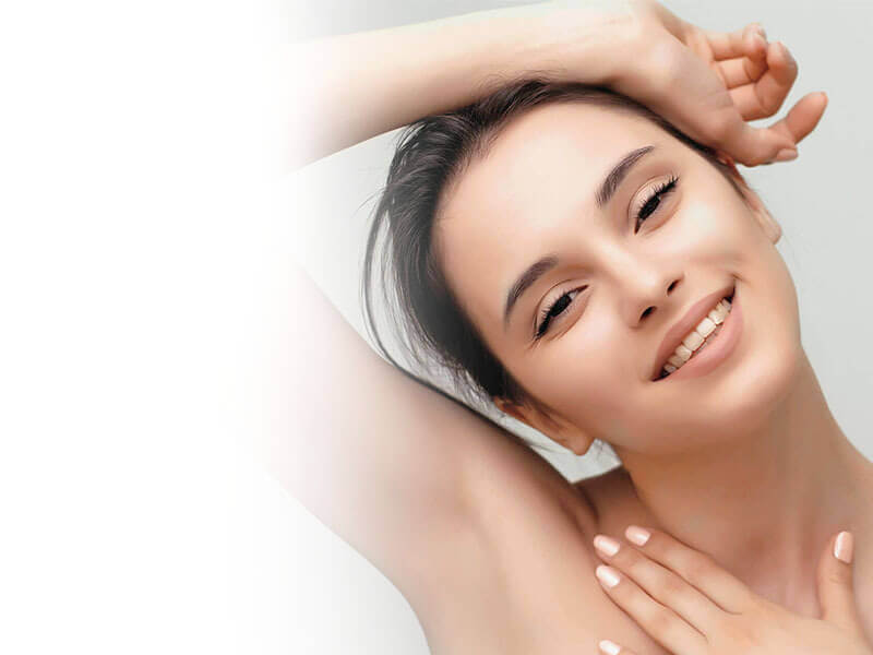 Smiling Woman with hand above her head